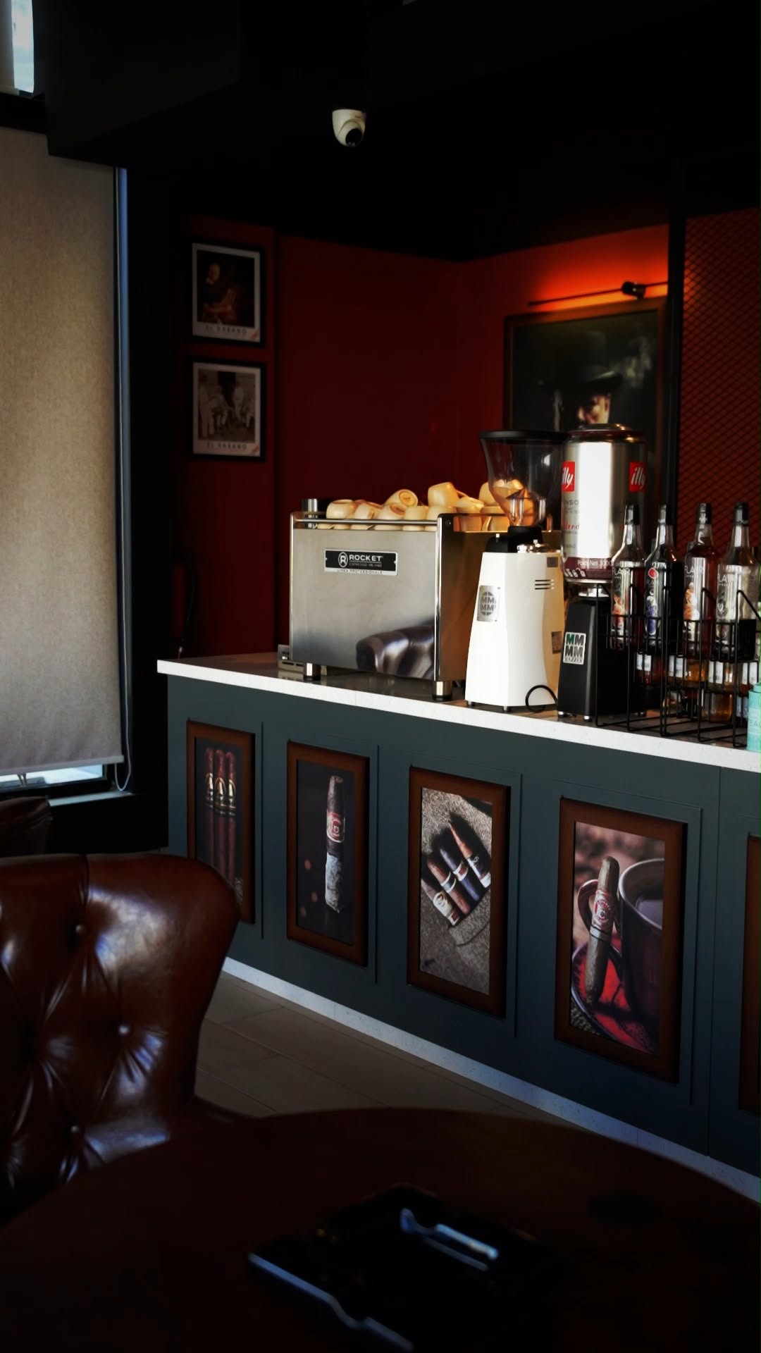Don Safa bar with Rocket espresso machine and framed cigar art